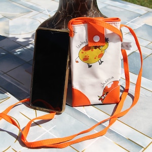 Shoulder bag for cell phone in waxed canvas “Cows” pattern, fully lined – Artisanal creation