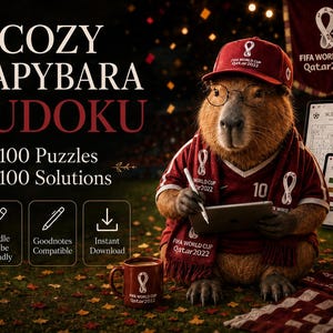 Könnte beinhalten: Ein Wasserschwein mit einer bordeauxroten FIFA World Cup Qatar 2022 Kappe, Schal und Trikot hält einen Eingabestift und ein Tablet. Der Text lautet: COZY CAPYBARA SUDOKU, 100 Puzzles, 100 Solutions, Kindle Scribe Friendly, Goodnotes Compatible, Instant Download. Ein Becher und ein Fußball liegen daneben.