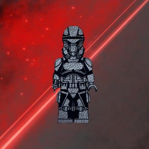 May include: A black and silver Lego minifigure of a Star Wars Stormtrooper with a detailed helmet and armor.