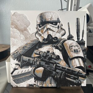 May include: A black and white illustration of a Stormtrooper from Star Wars. The Stormtrooper is wearing a weathered helmet and armor, and is holding a blaster rifle. The background is a cloudy, gray sky.