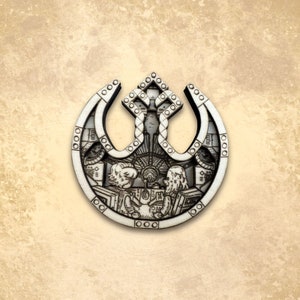 May include: A wooden cutout of the Rebel Alliance symbol from Star Wars. The symbol is a circle with a white background and a black outline. Inside the circle is a stylised image of a spaceship with two figures inside. The spaceship is surrounded by a series of concentric circles.
