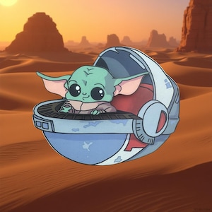 May include: A cartoon illustration of a green alien-like character with large eyes, seated in a blue and red pod. The background shows a desert landscape with a setting sun.