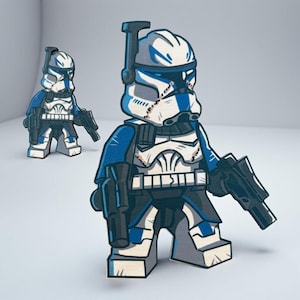 May include: Illustration of a blue and white cartoon character in a helmet and armor, holding a black gun. A second, smaller character is in the background. The character is in a Lego-like style.