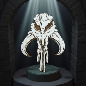 May include: A wooden, stylized skull with curved horns, displayed on a pedestal. The skull is primarily white with brown accents, and is set against a dark background with a spotlight effect, creating a dramatic presentation.