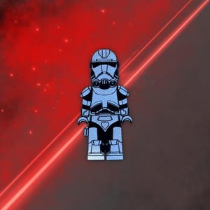 May include: A blue and black Lego minifigure of a Star Wars clone trooper. The figure has a white helmet with a black visor and a black blaster rifle.