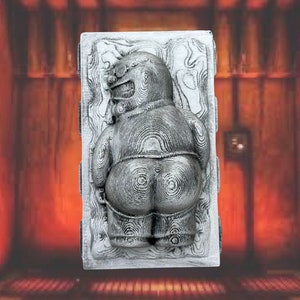 May include: A silver-colored, detailed, 3D printed sculpture of a snowman with a menacing expression. The sculpture is set against a red background.