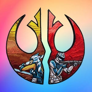 May include: A red and orange embroidered patch with a stylized symbol of a rebel alliance symbol. The symbol is split in half, with a blue and white character on the left side and a blue and white character on the right side.
