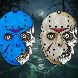 May include: Two hockey masks, one blue and one beige, with a skull design on the right side. The blue mask has purple accents, while the beige mask has red accents. Both masks have black dots and eye holes.