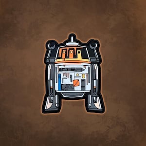 May include: A white, orange, and black robot with a detailed design. The robot has a rectangular body with a round head and two arms. The robot is standing on a brown background.