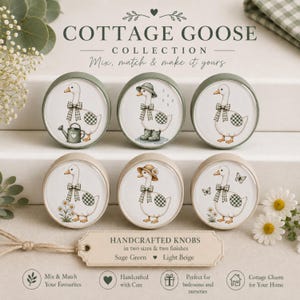 May include: Six round knobs featuring illustrations of white geese wearing green and white chequered bows. The top row has sage green rims, and the bottom row has light beige rims. Each goose is depicted in different scenes with items like a watering can, rain boots, or flowers.