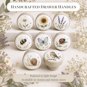 May include: A set of eight round drawer handles painted in light beige, featuring illustrations of a daisy, sunflower, lavender, bee, butterfly, ladybug, snail, and robin. The text reads Handcrafted Drawer Handles and Available in 35mm and 48mm sizes.