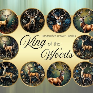 May include: Handcrafted drawer handles with detailed illustrations of deer in a forest setting. Each handle is a circular design with a gold border, showcasing a stag amidst floral elements. The text "King of the Woods" is also displayed.