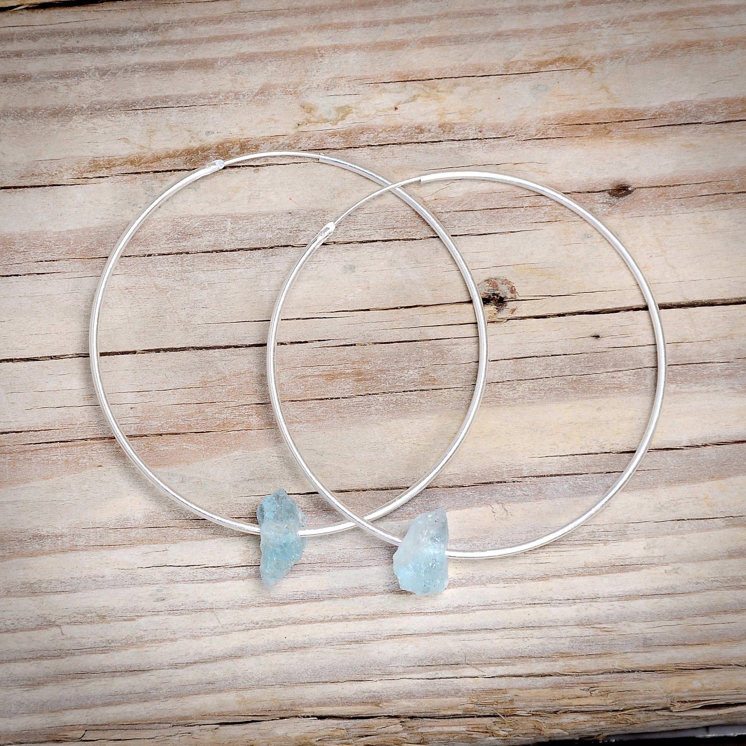 Large hoop hotsell earrings with charm
