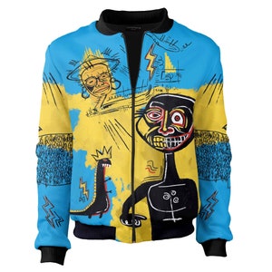 May include: A blue and yellow bomber jacket with a black collar and cuffs. The jacket features a colorful, abstract design with figures and symbols in black, yellow, and red. The jacket has a full-length zipper.