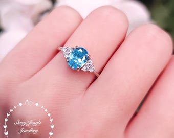 Oval Three Stone Swiss Blue Topaz Ring, 2 carats 6*8 mm Swiss Blue Topaz Engagement Ring, Electric Blue Ring, December Birthstone Gift