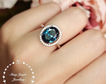 Modern Halo London Blue Topaz Engagement ring, 3 Carats 8*10 mm Oval Cut Dark Teal Blue Topaz promise ring, Micro Pavé Halo Topaz Ring