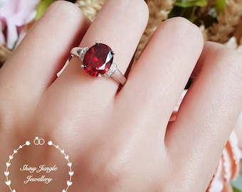 Oval Garnet ring, Red Garnet engagement ring, red stone ring, wine red garnet ring, white gold plated sterling silver, three stone ring