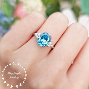 Oval Three Stone Swiss Blue Topaz Ring, 3 carats 8*10 mm Swiss Blue Topaz Engagement Ring, Electric Blue Ring, December Birthstone Gift