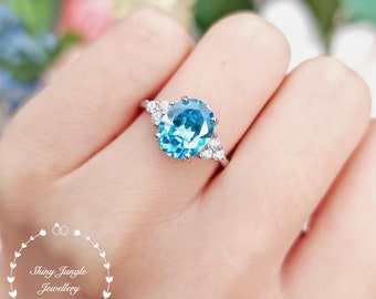 Oval Three Stone Swiss Blue Topaz Ring, 3 carats 8*10 mm Swiss Blue Topaz Engagement Ring, Electric Blue Ring, December Birthstone Gift