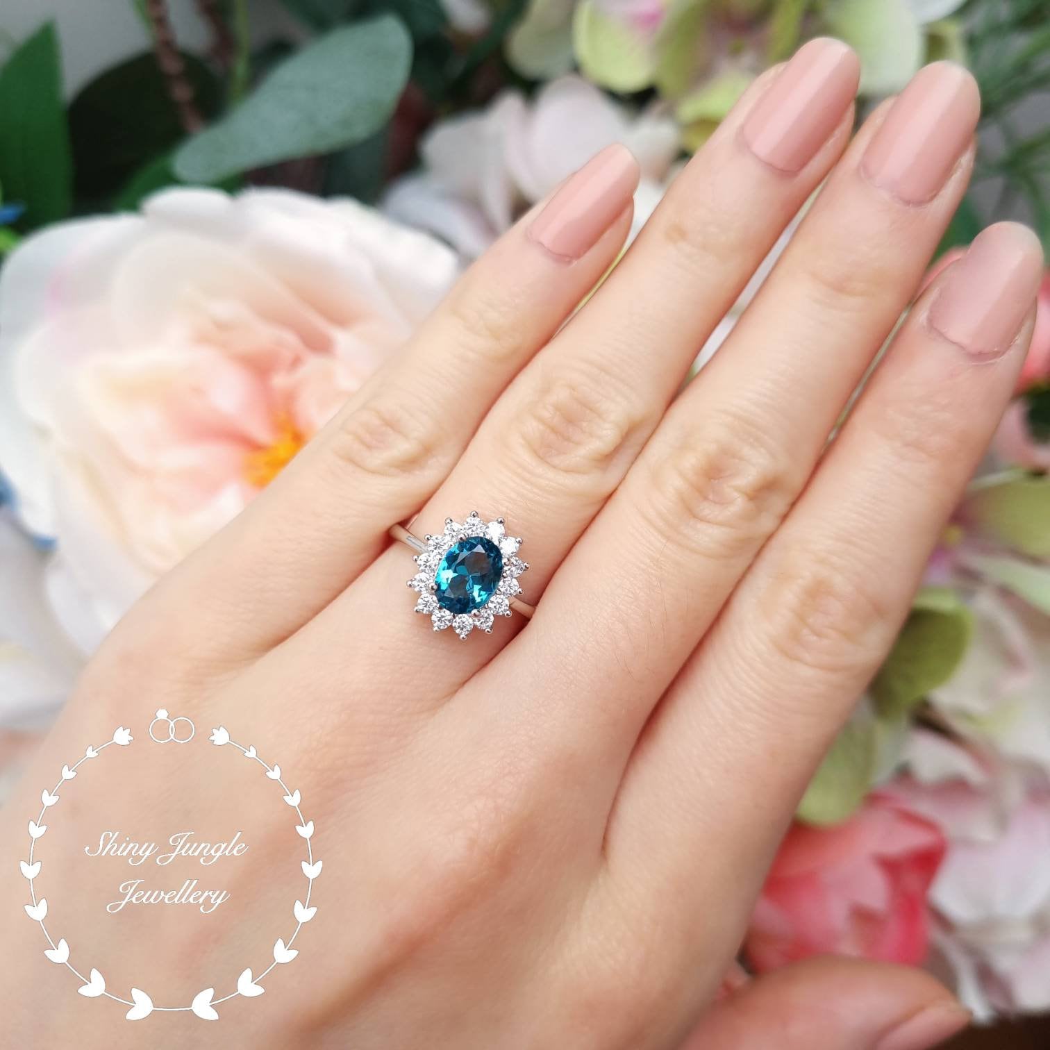 Oval blue shop topaz ring