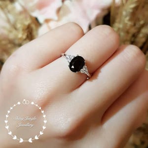 Black Stone Ring With White Veins