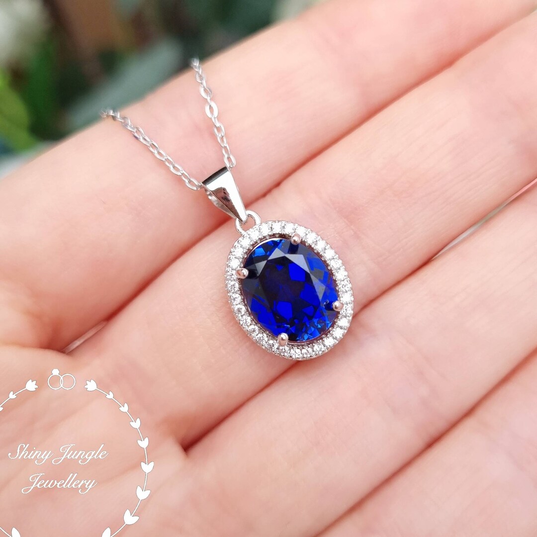 Sparkling Aqua Blue Gemstone Necklace with Halo Design