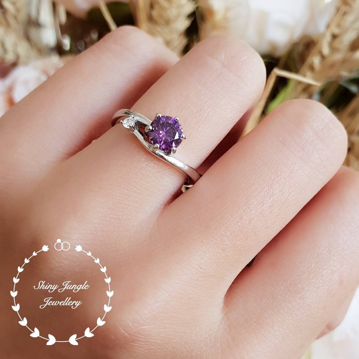 Fashion silver ring with big violet phosphosiderite stone Stock Photo -  Alamy