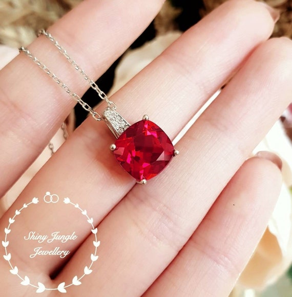 Lab-Grown East-West Oval Ruby Solitaire Pendant | Angara