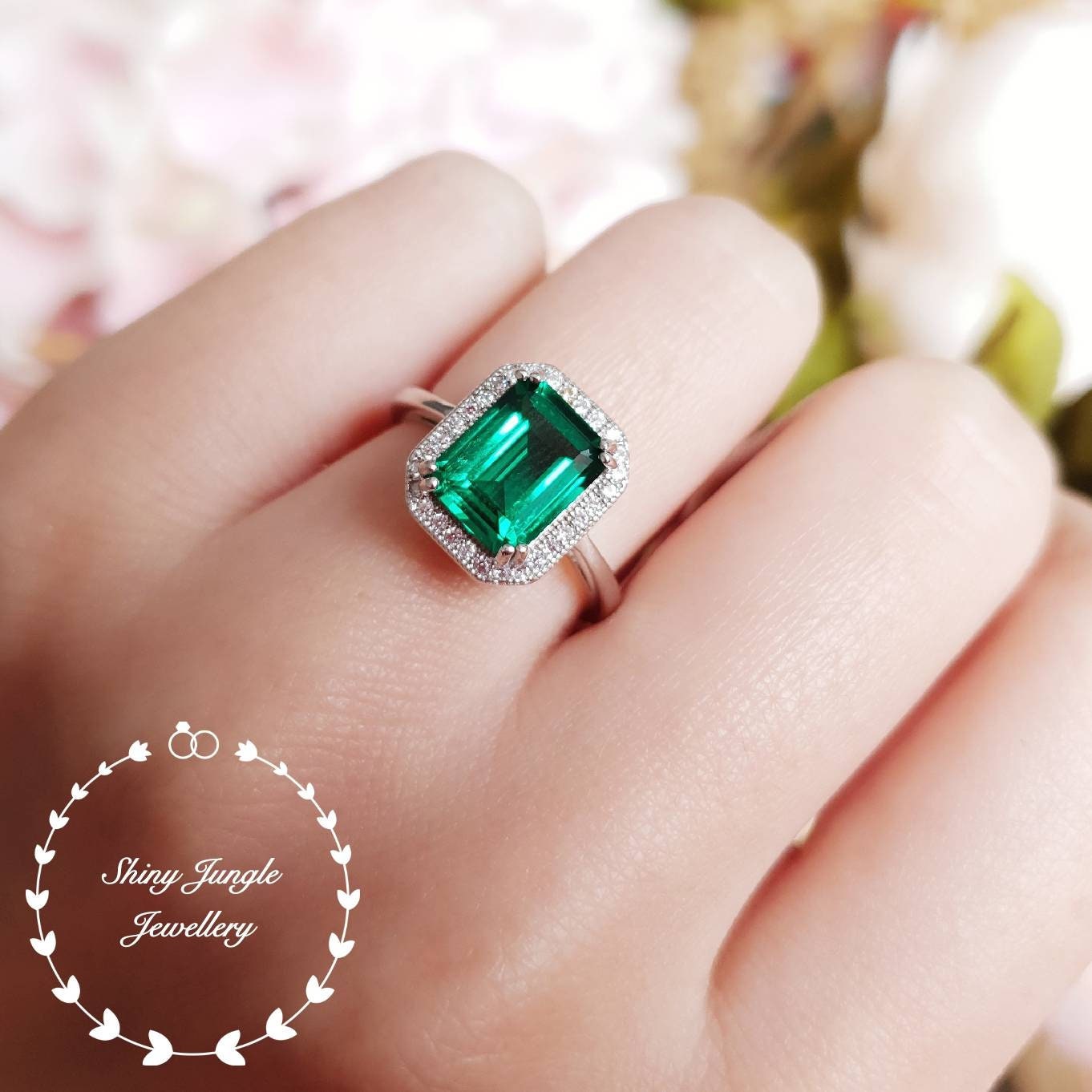 Halo emerald cut emerald engagement ring vivid green emerald ring
