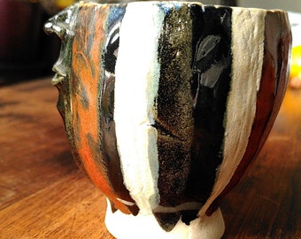 Face mug in white stoneware and several black white brown enamels, Gentlemug Collection