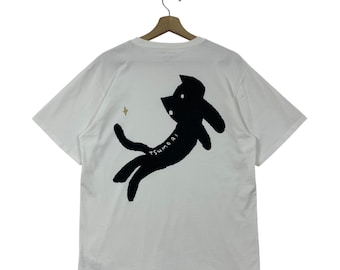 TSUMORI CHISATO by Niko And.. art Printed tee