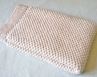 Light gray handmade knitted baby blanket