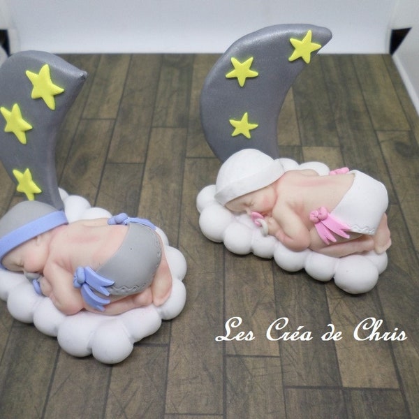 Centre de table décoration bébé endormi sur son nuage, sa lune et ses étoiles en fimo au choix.