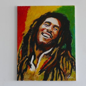 Bob Marley portrait painting on canvas, a beautiful art piece showing the famous singer in reggae colors