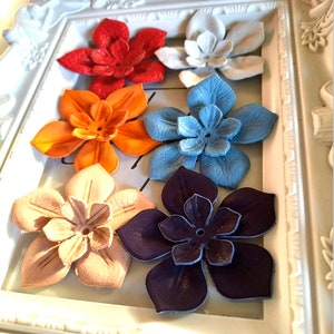 35 colors to choose from; handmade leather flowers in several colors and mixed flowers, shaped