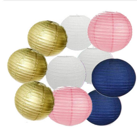 white and gold paper lanterns