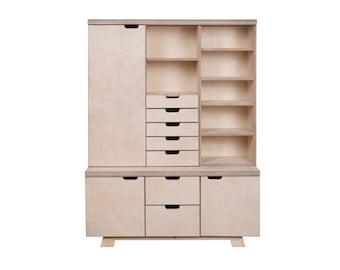 May include: A light wood cabinet with a closed door on the left, open shelves on the right, and drawers in the center. The cabinet has a lower section with two doors and a drawer.
