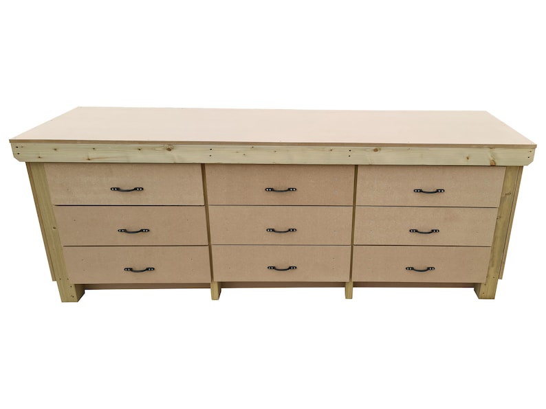 May include: A wooden workbench with nine drawers and black metal handles. The workbench is made of light wood and has a natural finish.