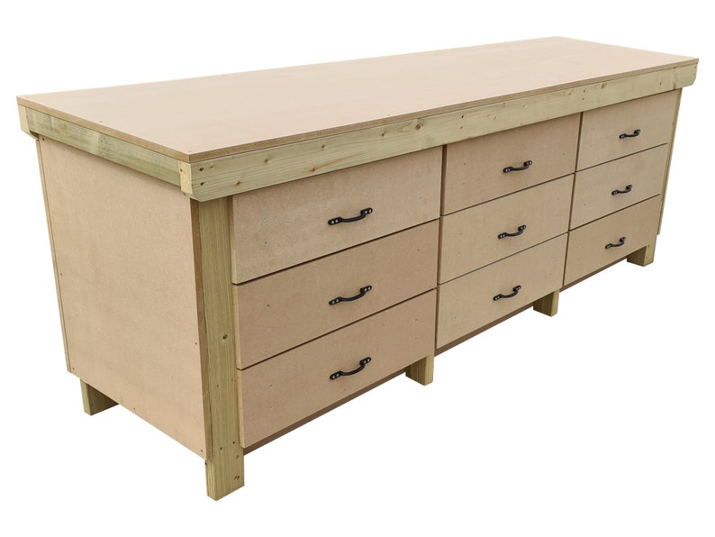 May include: A wooden workbench with a large work surface and eight drawers. The drawers have black metal handles.