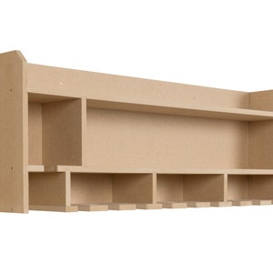 May include: A light brown wooden wall shelf with multiple compartments and a bottom row of wine bottle holders.