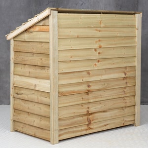 May include: A wooden storage shed with a slanted roof and a natural wood finish. The shed is made of horizontal planks and has a solid back.