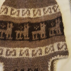 Peruvian knitted hat and socks. Warm, fuzzy alpaca wool, tan, brown and white. Hat has ear flaps. Socks 18&quot;. FREE SHIPPING