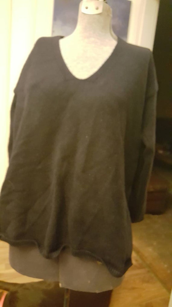 Women's black V-neck sweater. Soft, rabbit fur and