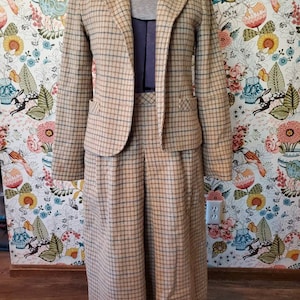 Vintage 1970s era ladies suit. Beige/blue/brown plaid, wool blend jacket and skirt, Dalton, satin lined. Size M/Medium. FREE SHIPPING