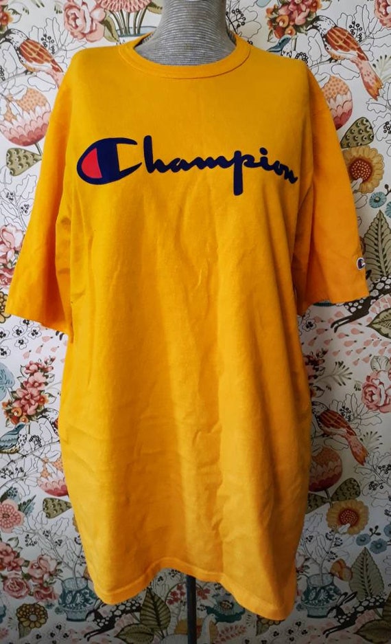 Vintage 1980s era bright gold Champion brand T sh… - image 1