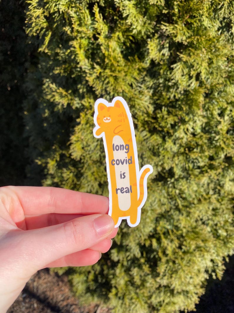 May include: Orange cat sticker with the text "long covid is real".