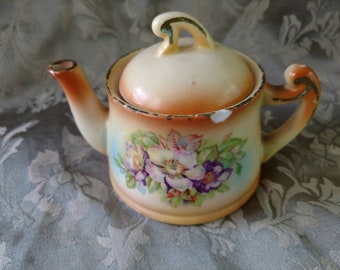 Vintage Czechoslovakian lustreware teapot, floral design.