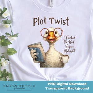 May include: White t-shirt featuring a whimsical illustration of a goose wearing glasses and holding a book and a coffee cup. The text "Plot Twist" and "I Finished The Book Before Midnight!" are printed above and to the right of the goose.