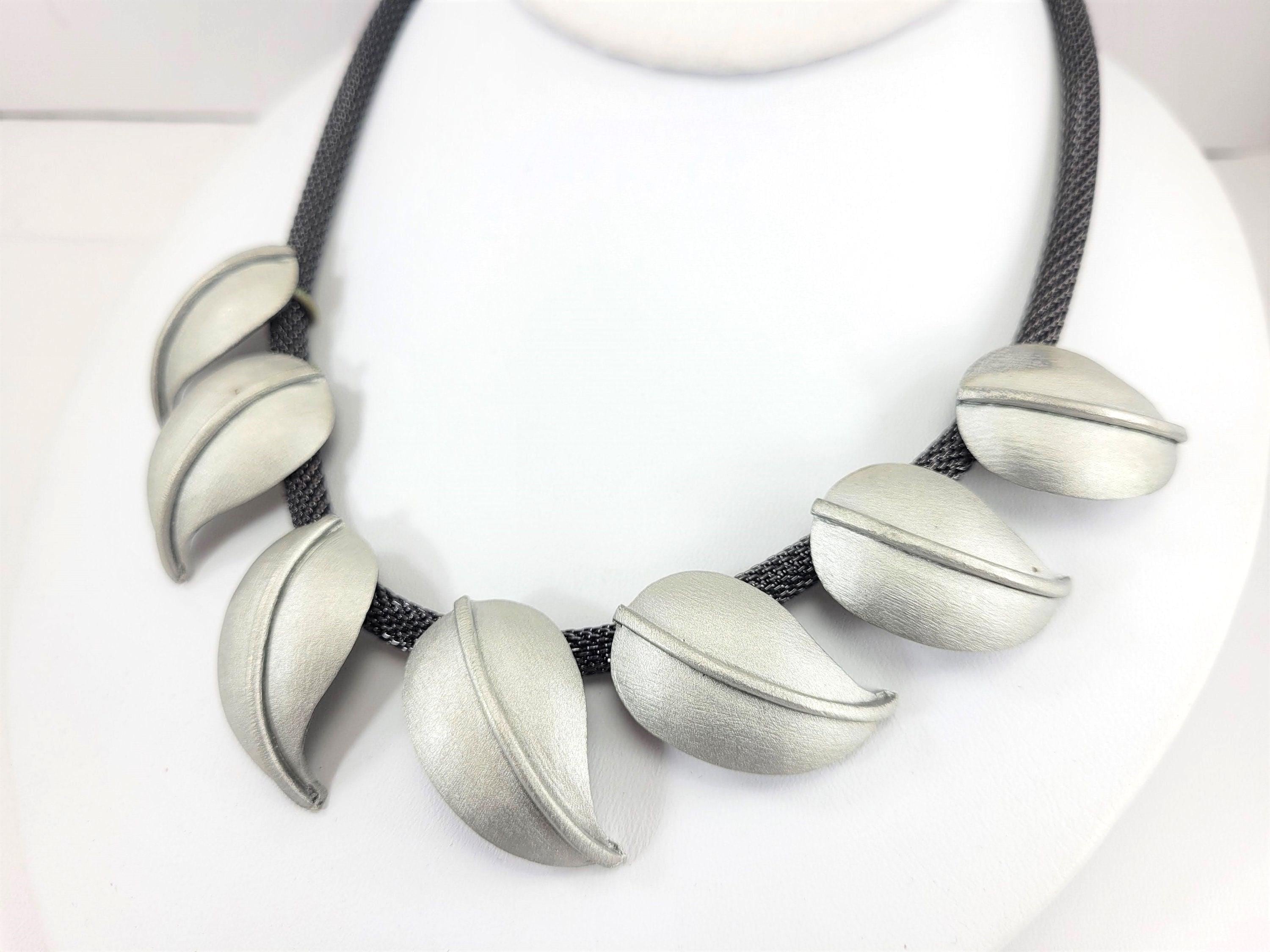 Silver Sculptural post pierced Earrings by ROBIN KAHN. Robin Kahn main image 3