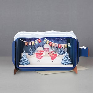 Christmas,3D pop-up card, Handmade,,Ice skating,Santa,Rudolph,Snowy trees,Christmas bunting,Lights,Laser cut,3D message in bottle, Gift card